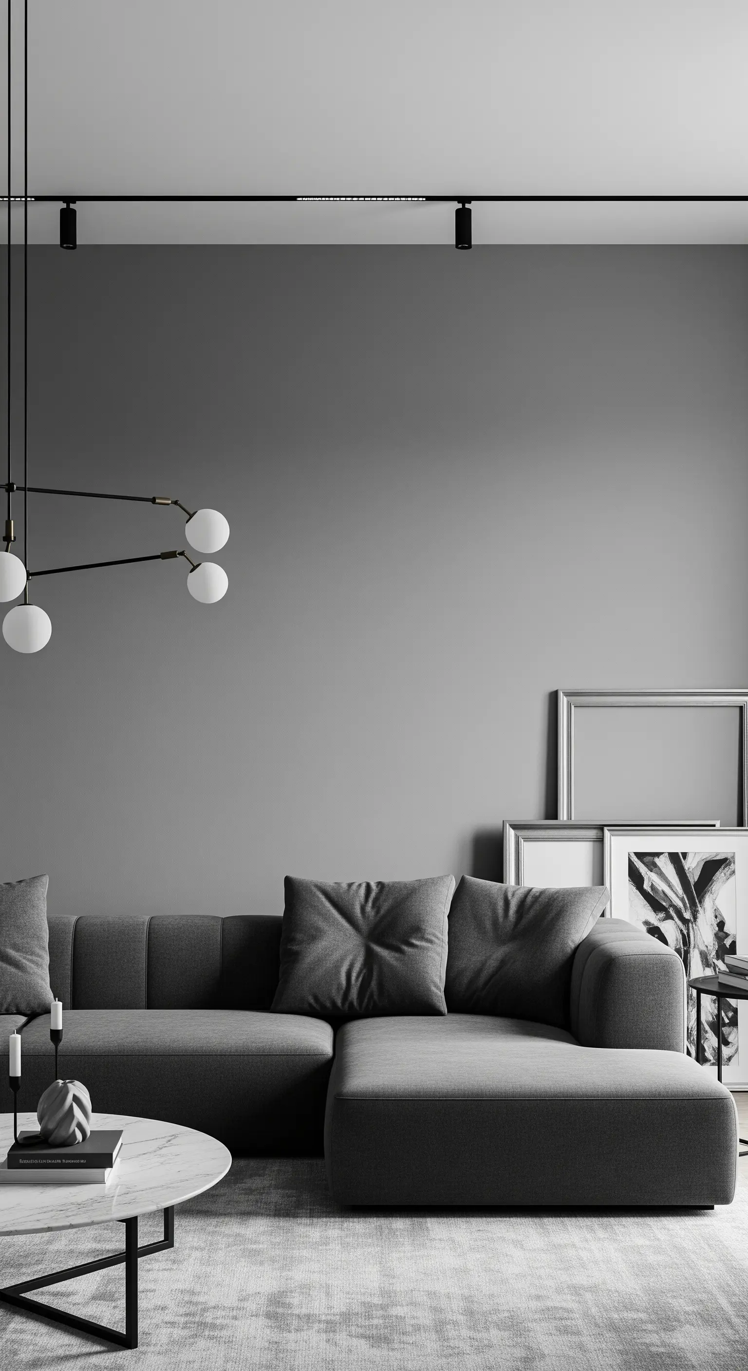 Salotto moderno interamente arredato con diverse sfumature di grigio.